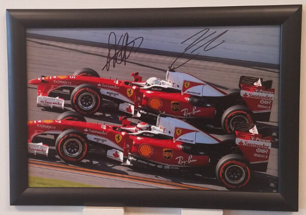 Sebastian & Kimi Autographed Photo