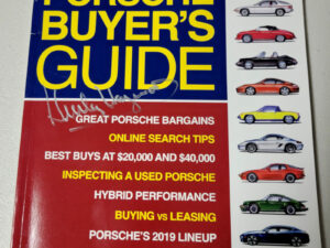 Porsche Buyers Guide Autographed by Hurley Haywood